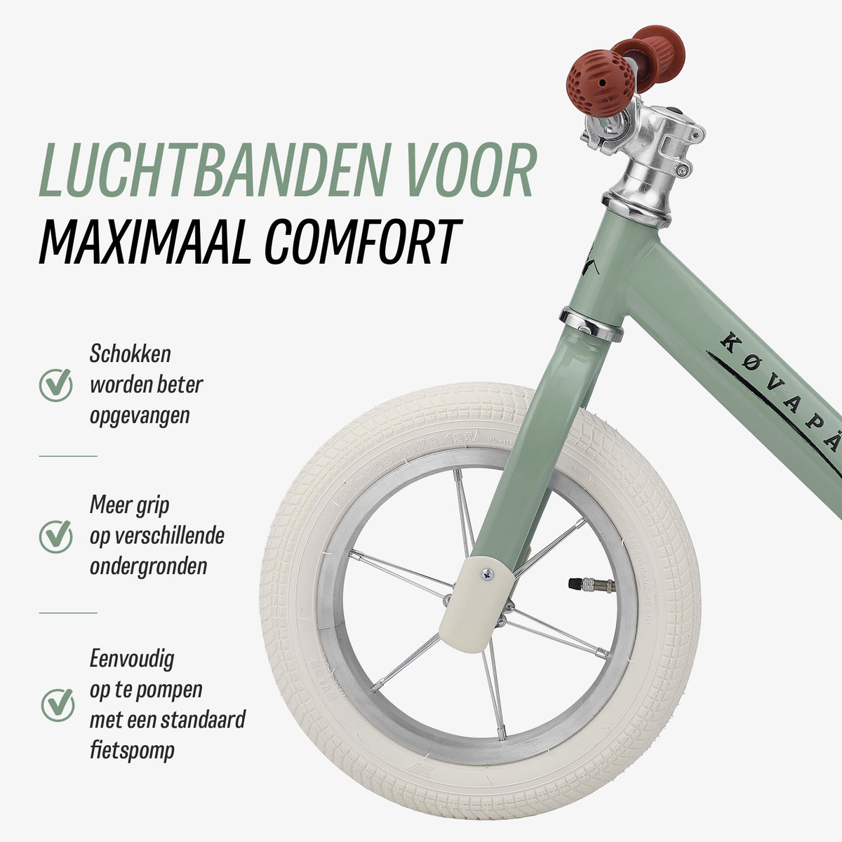 luchtbanden op groene Køvapää loopfiets voor extra comfort