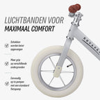 grijze Køvapää loopfiets met luchtbanden