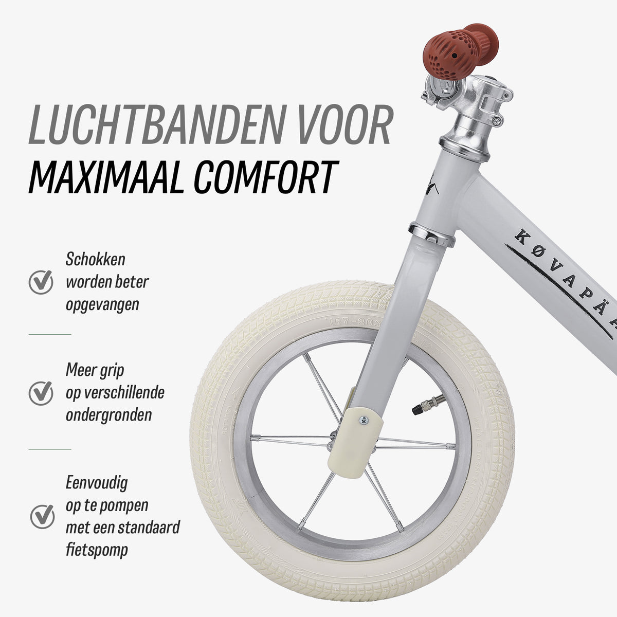 grijze Køvapää loopfiets met luchtbanden