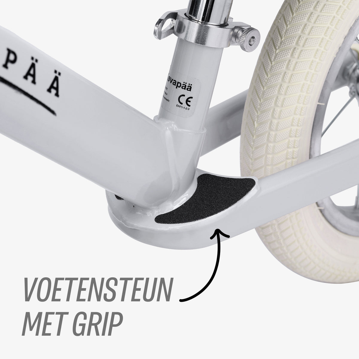 detail van geïntegreerde voetensteun op grijze Køvapää loopfiets