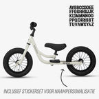gratis stickerset bij krijtgrijze Køvapää 2-in-1 loopfiets