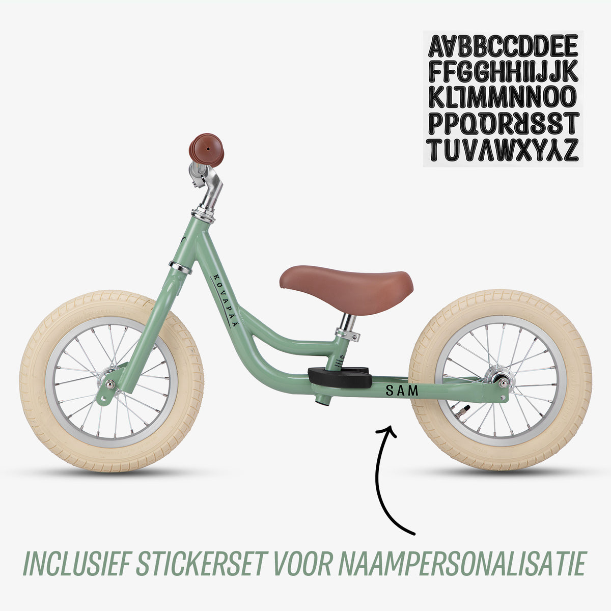 gratis stickerset bij groene Køvapää 2-in-1 loopfiets