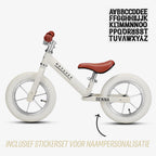 gratis stickerset bij beige Køvapää loopfiets
