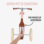 afneembare duwstang bij roze Køvapää 2-in-1 loopfiets